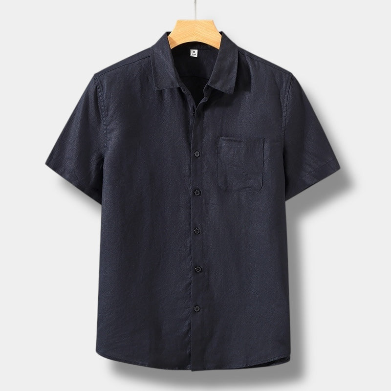 Black men's linen shirt with short sleeves, button front, and single chest pocket