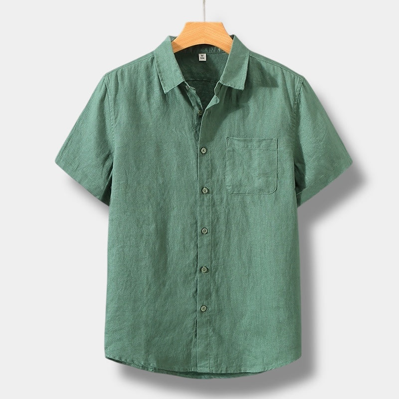 Green men's summer linen button up shirt with short sleeves, collar, and front pocket