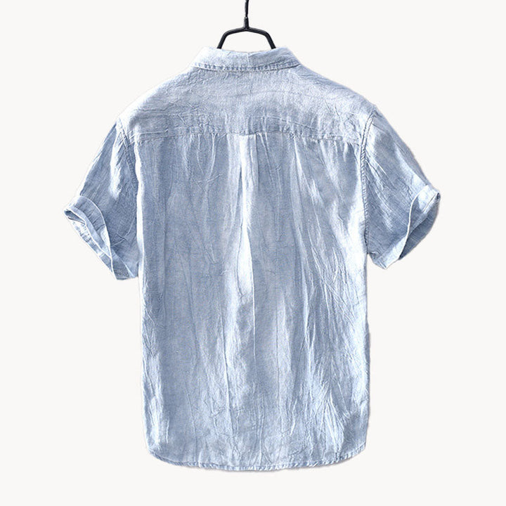 Back view of light blue short sleeve linen shirt with relaxed summer fit