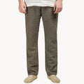 Olive green men's summer linen straight leg pants with loose fit and natural texture