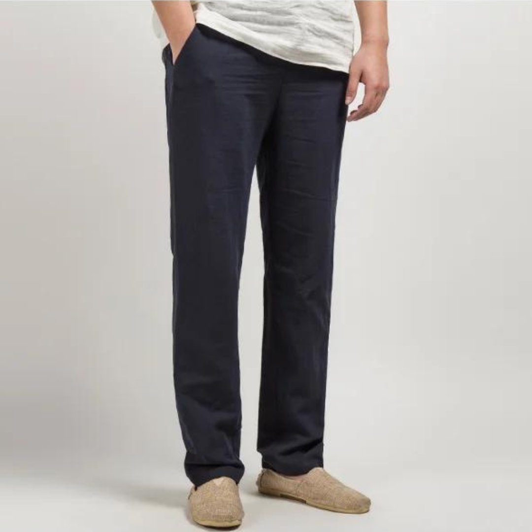 Navy men's summer linen pants with straight leg silhouette and casual pocket detail