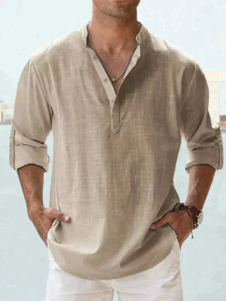 Tan men's summer linen V neck shirt with rolled sleeves and lightweight casual design