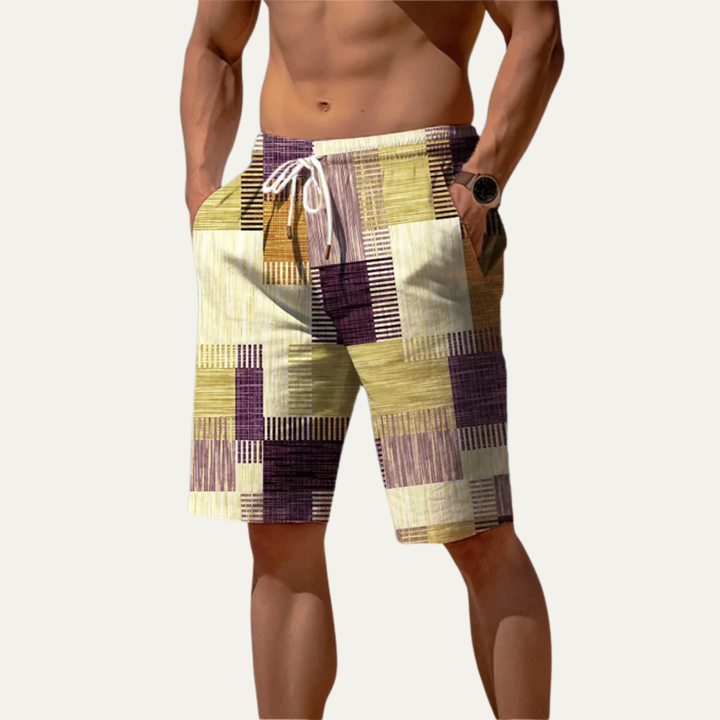 Model wearing patchwork check knee length shorts in purple and yellow with side pockets