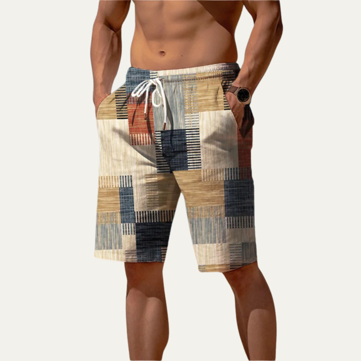 Men's summer patchwork check shorts in tan, navy and cream with knee length cut