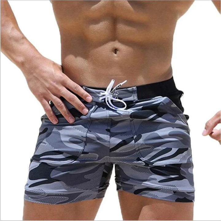Gray camo men's quick dry swim shorts with black waistband and white drawstring, front view