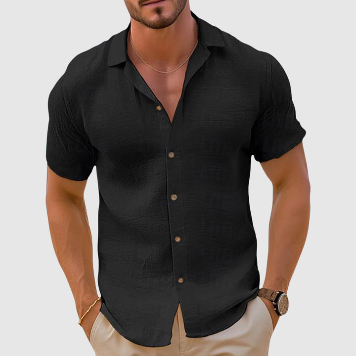 Black men's summer short sleeve button up shirt with relaxed fit and open neckline