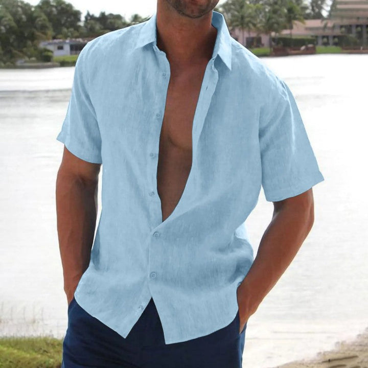 Light blue men's linen shirt with short sleeves and button-up front