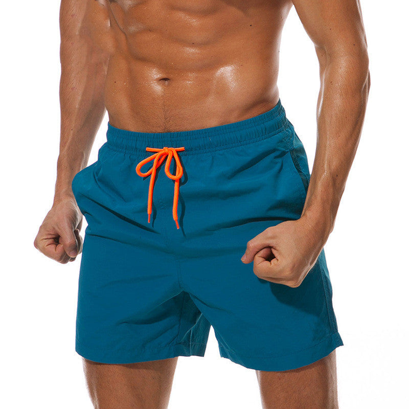 Teal men's swim shorts with orange drawstring, elastic waist summer shorts