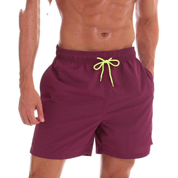 Maroon men's swim shorts with lime drawstring and relaxed fit, beach shorts
