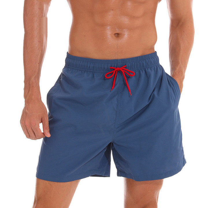 Navy men's swim shorts with red drawstring and loose fit, summer swim trunks