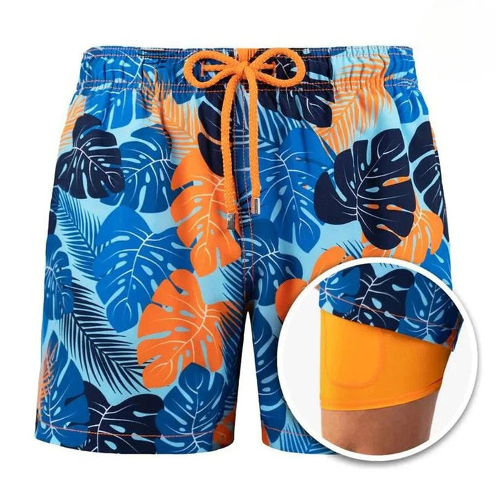 Blue and orange tropical men's swim shorts with drawstring and orange liner detail