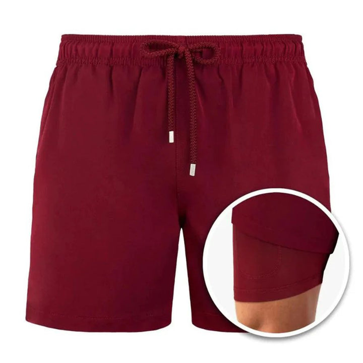 Burgundy men's swim shorts with drawstring waist and built-in liner close-up inset view