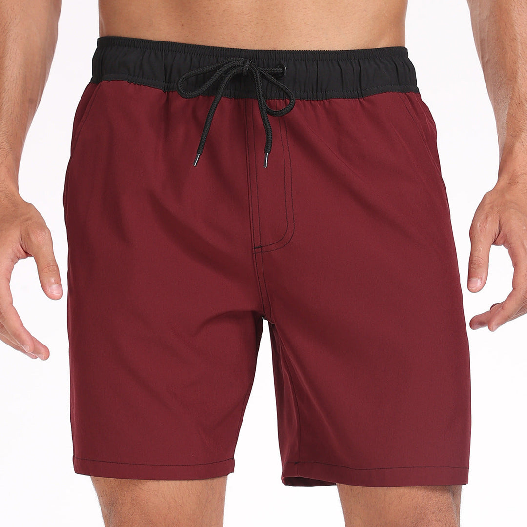 Burgundy men's swim shorts with black waistband and drawstring, solid color bathing suit shorts