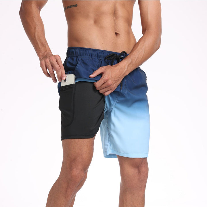 Blue and black men's swim shorts with side pocket holding a phone, summer beach shorts