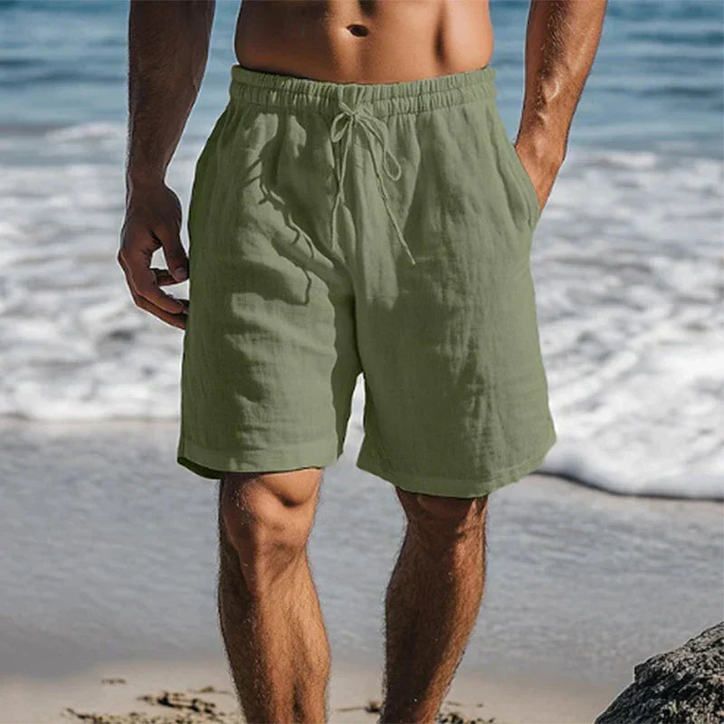 Olive green men's summer swim shorts with pockets and soft lightweight fabric