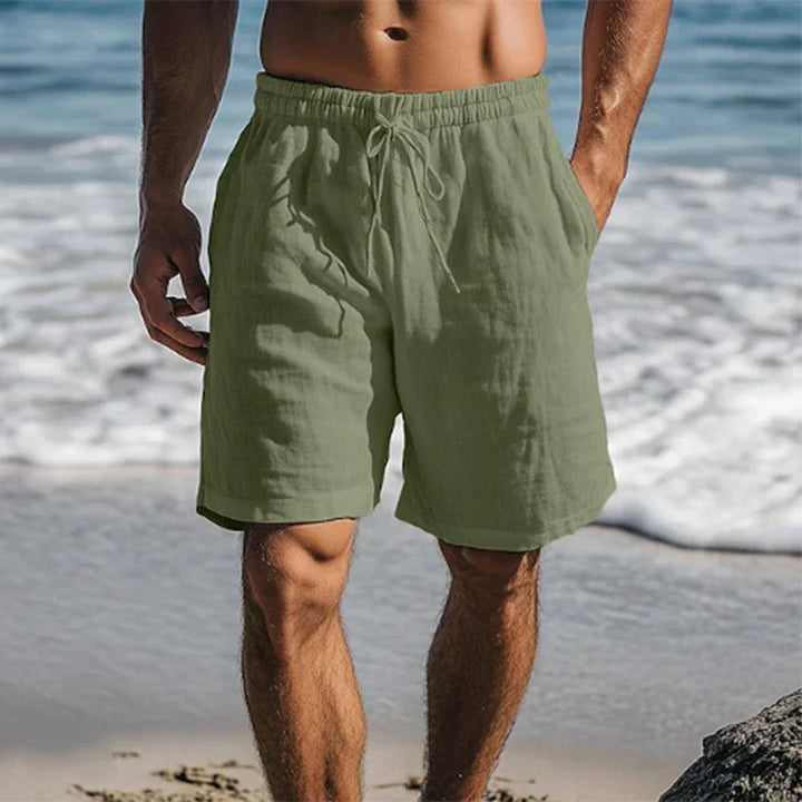 Olive green men's summer swim shorts with pockets and soft lightweight fabric