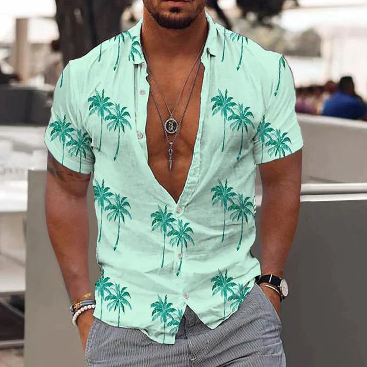 Mint green men's summer tropical print shirt with palm trees and open collar