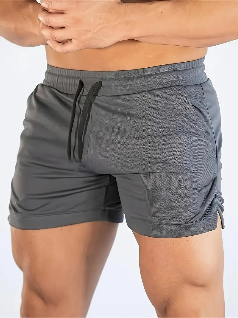 Charcoal gray men's swim shorts with quick dry fabric, elastic drawstring waist and side pocket
