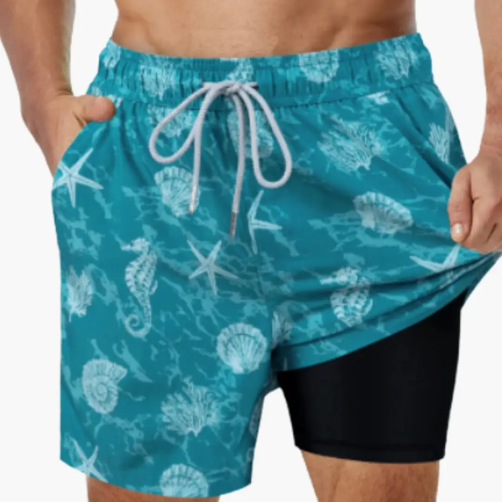 Turquoise men's swim shorts with seashell and starfish print, drawstring waist, and mesh lining