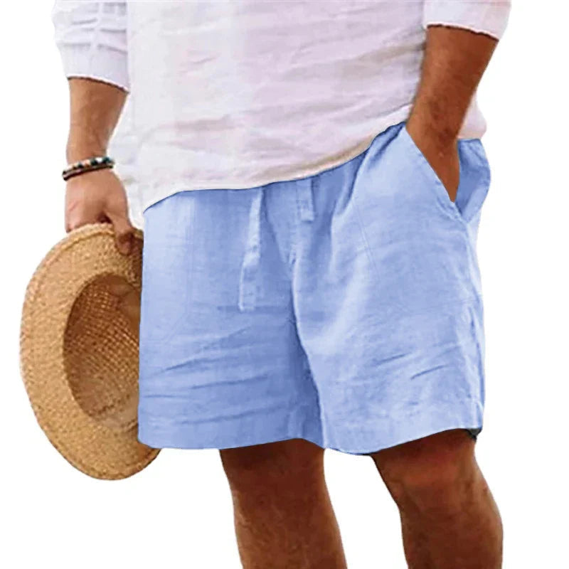 Gray cargo shorts with large side pocket and tan belt, angled product shot on textured gray