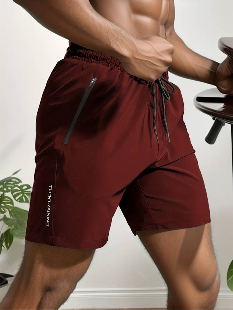 Dark gray cargo shorts with zip pockets and utility details, rugged casual pants side view