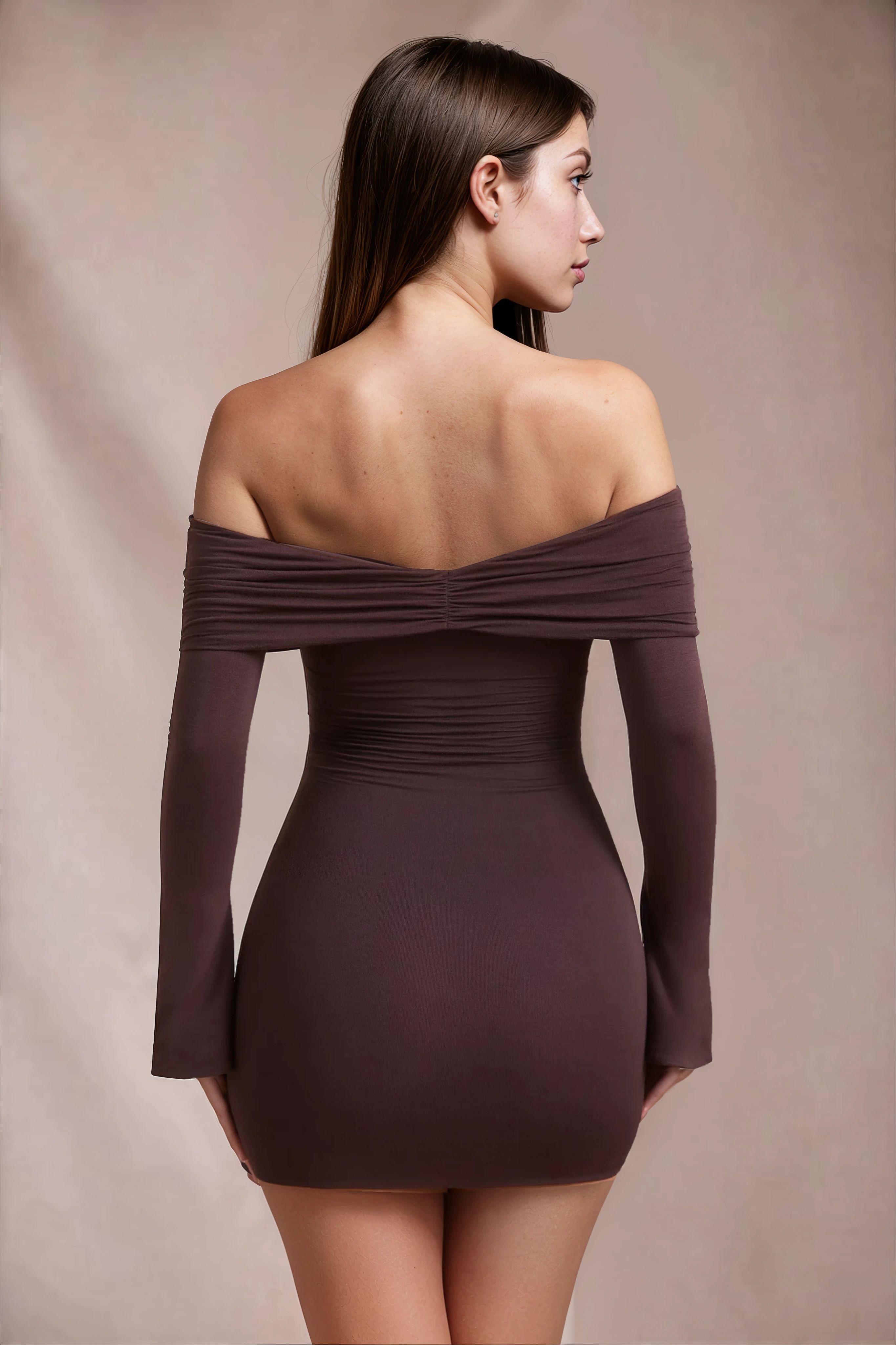 Brown bodycon mini dress with ruched off shoulder neckline and long sleeves for women, side view