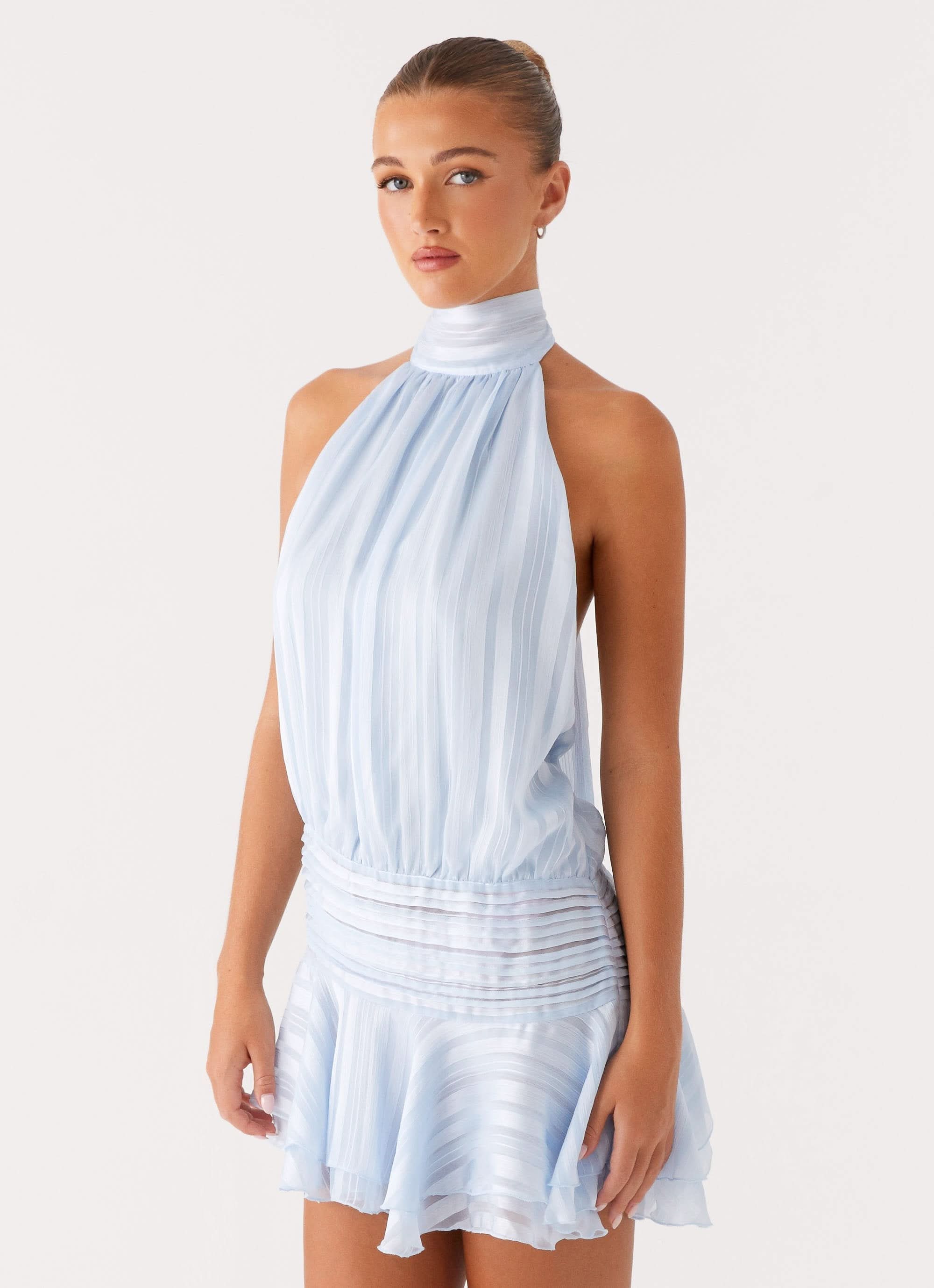 Full length view of light blue summer halter mini dress with white sandals