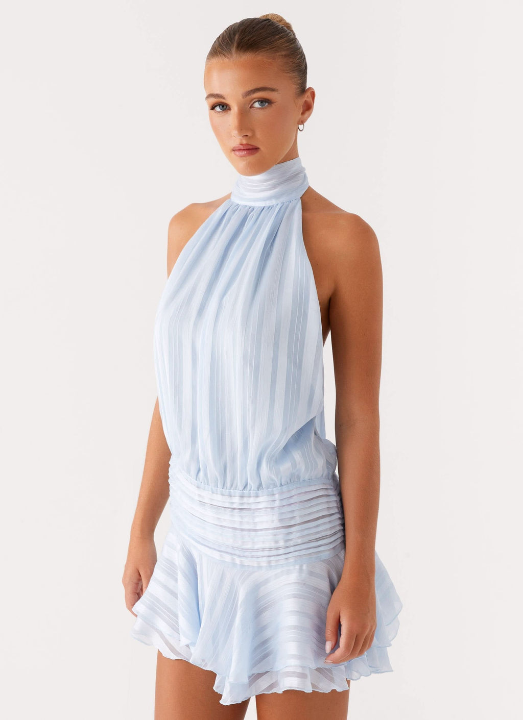 Light blue halter mini dress with pleated chiffon layers and flared skirt