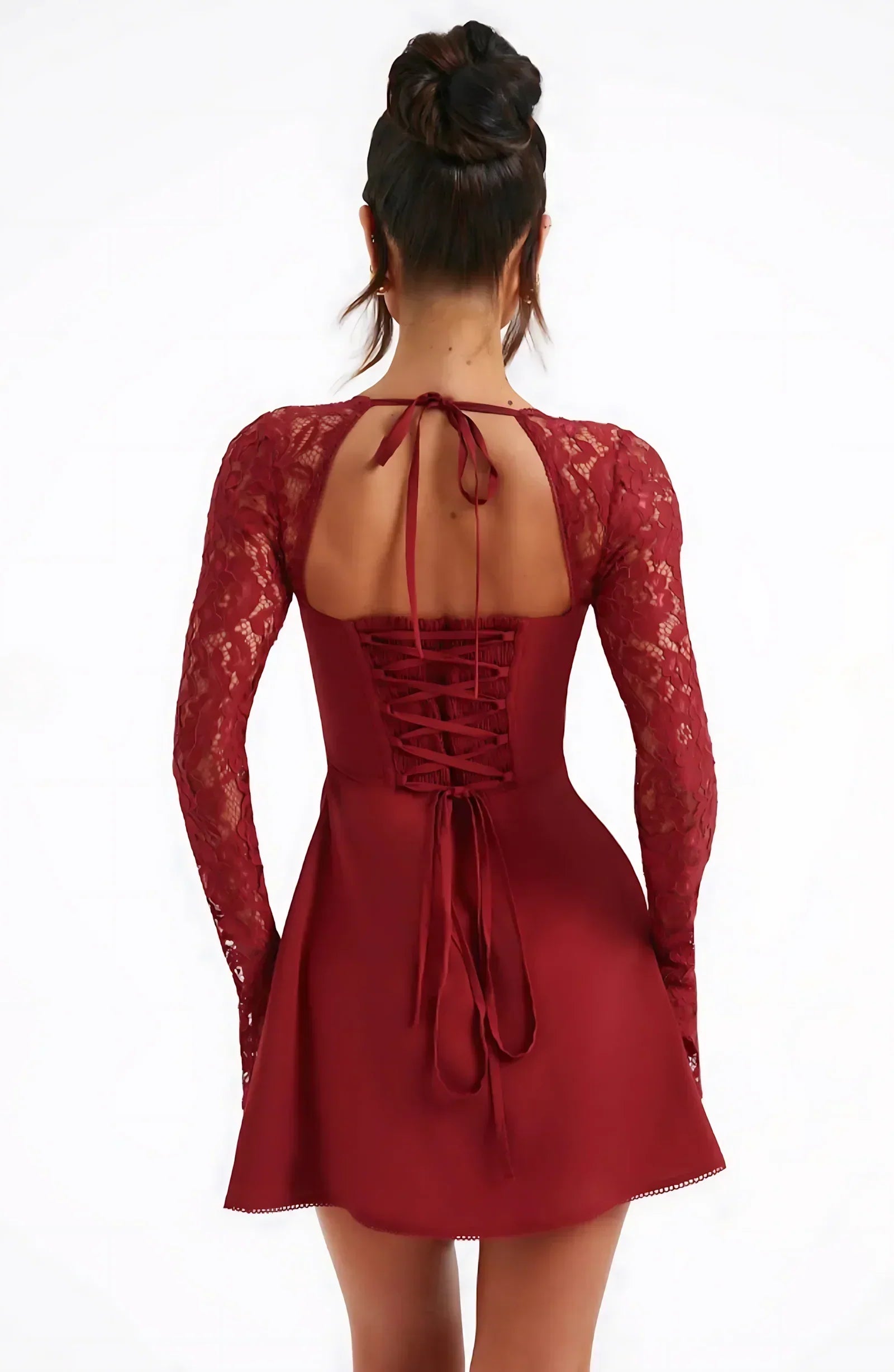 Back view of burgundy lace long sleeve mini dress with tie neck straps and lace-up back