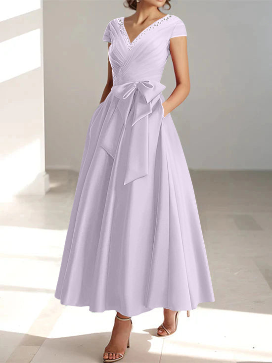 Lavender A-line midi dress with V-neck, short sleeves, and bow waist detail