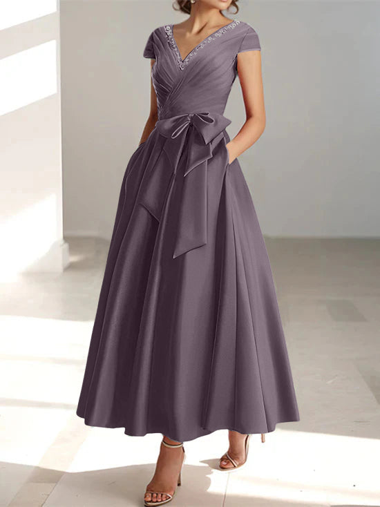 Mauve gray A-line midi dress with V-neck, short sleeves, and functional pockets