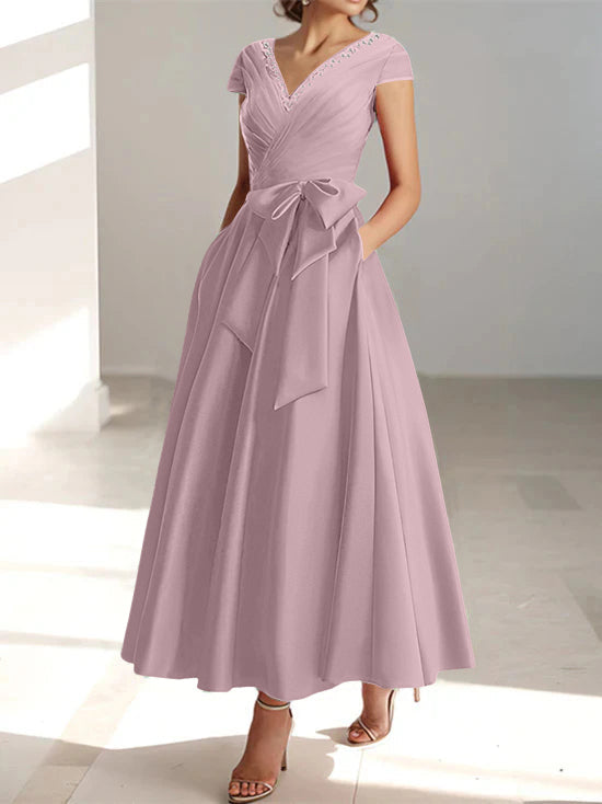 Dusty rose A-line midi dress with V-neck, short sleeves, and side pockets