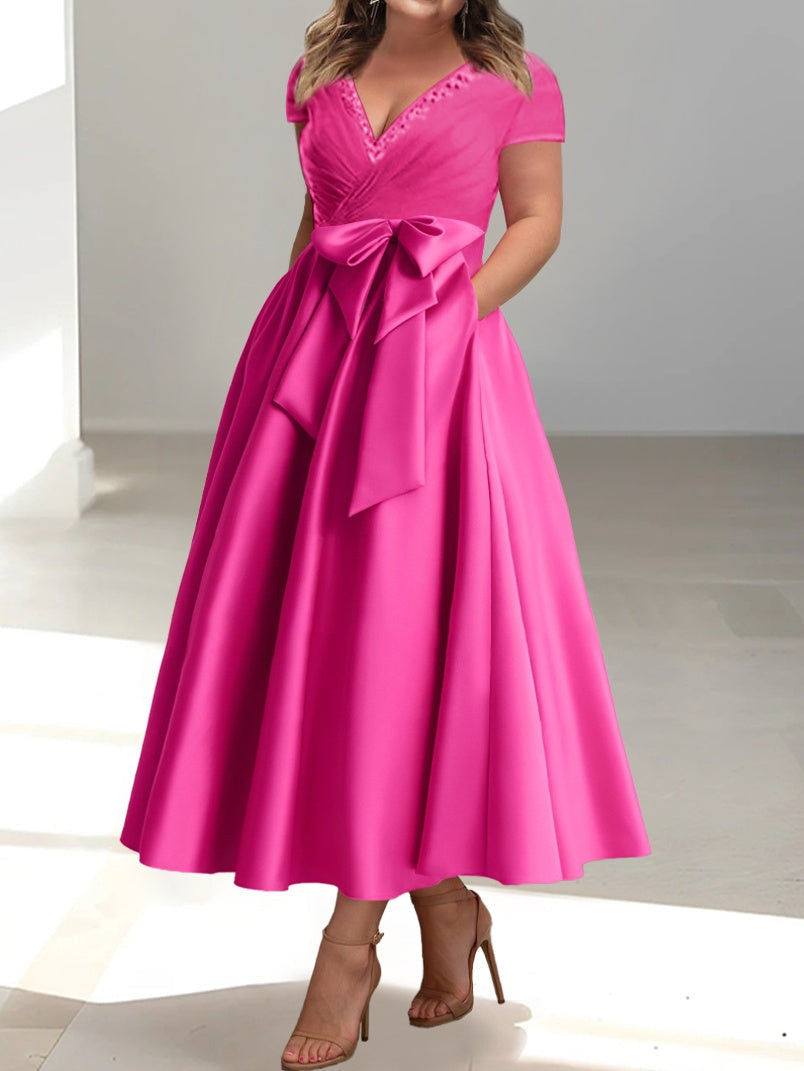 pink A-line midi dress with V-neck, short sleeves, pockets and bow tie