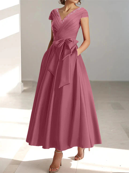 Dusty rose A-line midi dress with V-neck, short sleeves, and pockets