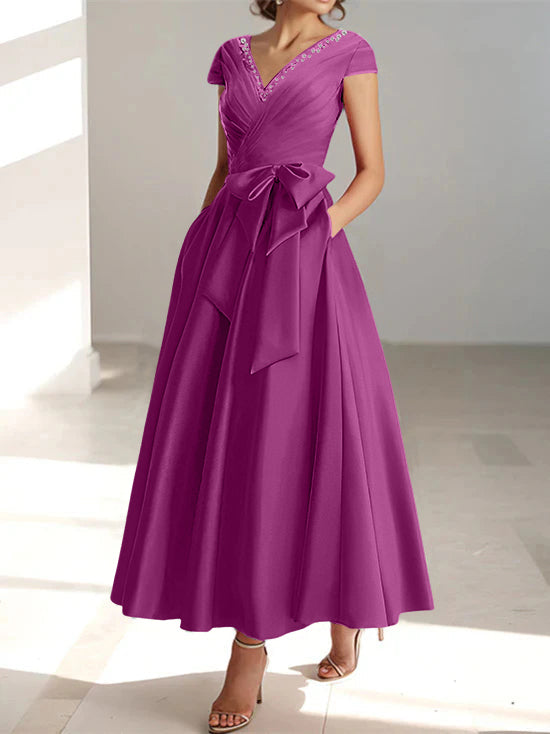 Magenta A-line midi dress with V-neck, short sleeves, and functional pockets