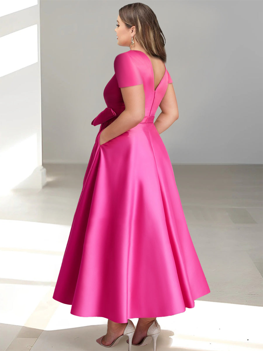 Back view of pink A-line midi dress with V-neck and side pockets