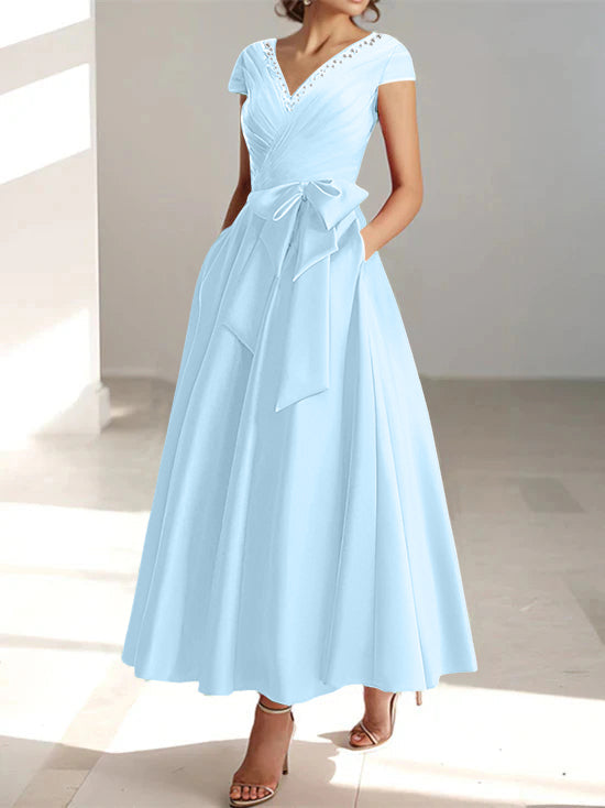 Light blue A-line midi dress with v-neck, short sleeves, and waist tie