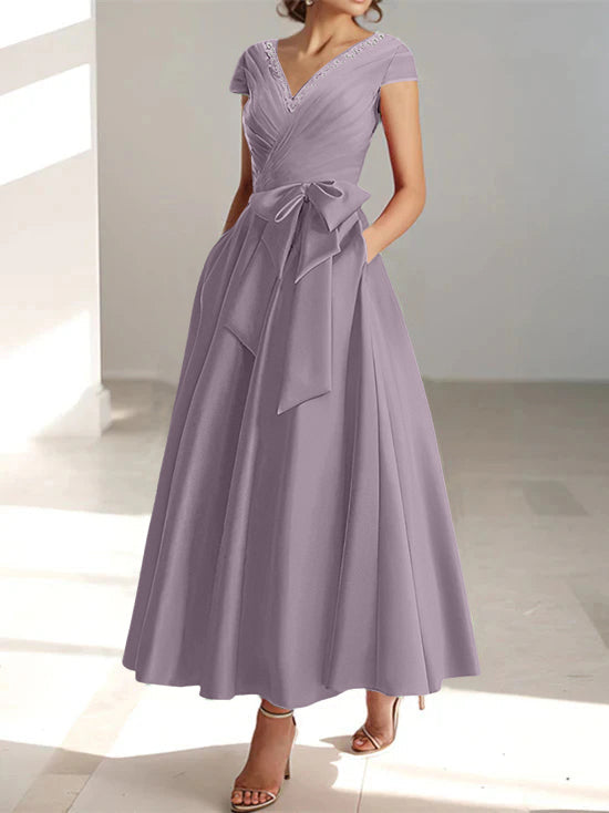 Lavender a-line midi dress with v-neck, short sleeves, and pockets