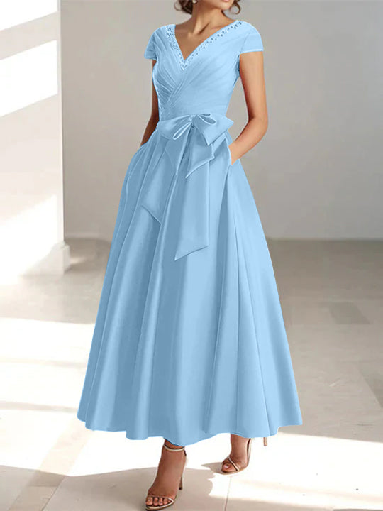 Light blue A-line midi dress with V-neck, short sleeves, and waist tie